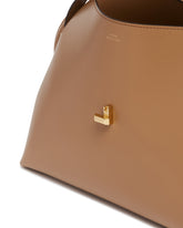 Beige T-Lock Leather Top Handle Bag | PDP | Antonia