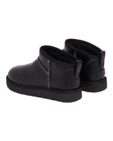 Black Classic Ultra Mini Leather Regenerate Boots | PDP | Antonia