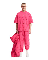 Nike x Jacquemus Pink Swoosh Sweatpants - Men's trousers | PLP | dAgency